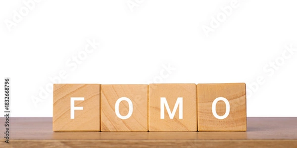Fototapeta Wooden blocks with word fomo for marketing fear of missing out concept, isolated on transparent background