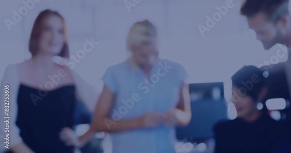 Obraz Collaborating five coworkers in work clothes discussing in bright office with computer monitor