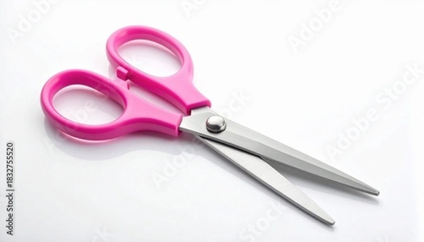 Fototapeta Pink-handled scissors with metallic blades on white background