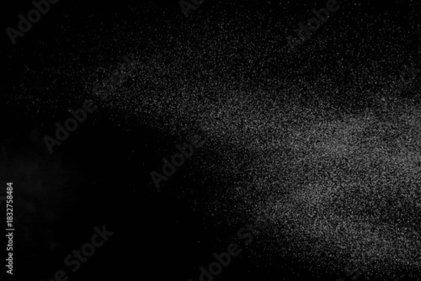 Obraz The falling white snow on a black background