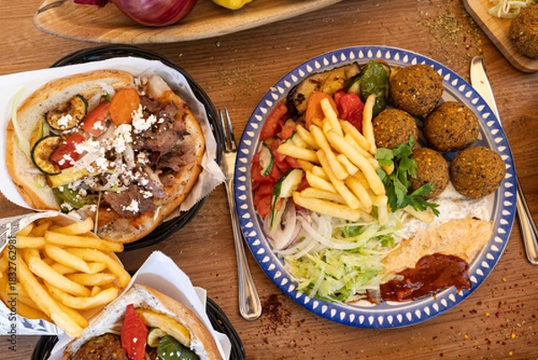 Obraz Doner kebab and falafel plates with fries