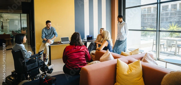 Obraz Diverse team having a collaborative discussion in a modern office setting