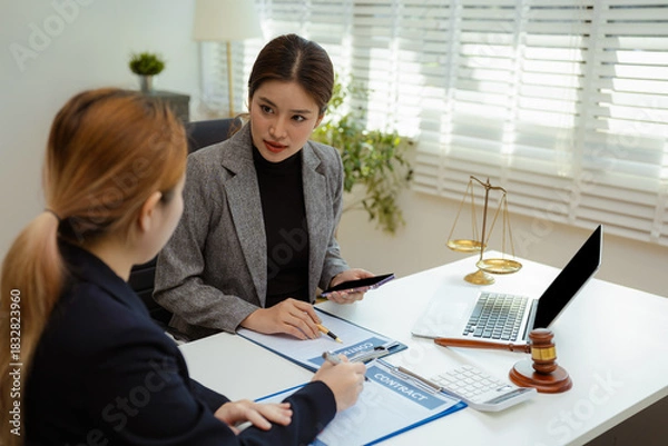 Obraz Teamwork of business lawyer meeting working hard about legal legislation in courtroom to help their customer.