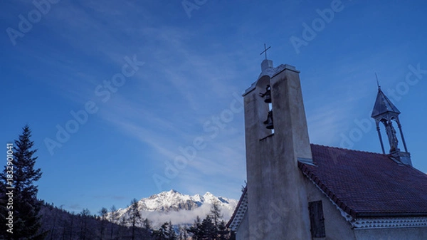 Fototapeta Notre-Dame de Bois vert chapel with snowy mountains