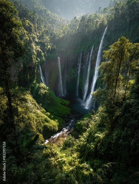 Obraz Majestic Tumpak Sewu Waterfall - Cascading Waters Through Lush Greenery, Indonesia.