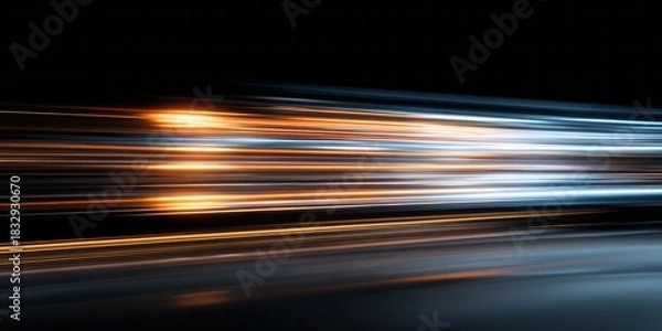Fototapeta Streaks of bright orange and cool blue light blur horizontally across a dark background, suggesting rapid motion.