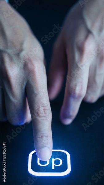 Fototapeta Finger Pressing Glowing Blue Up Button