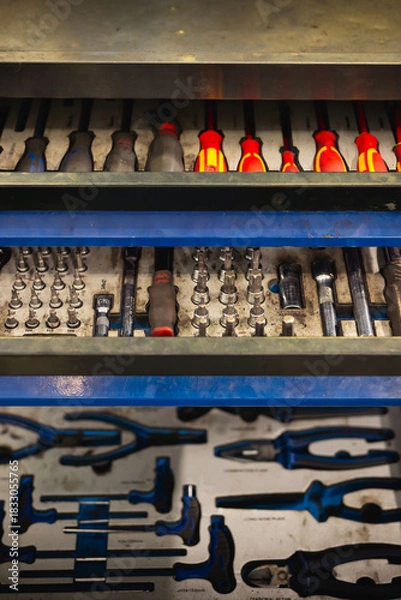 Fototapeta Large collection of sockets, ratchets, and accessories in a case. Professional tools for mechanical workshop and repair.