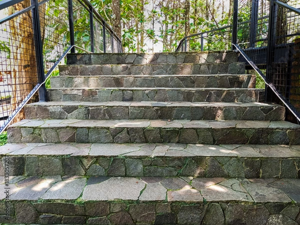 Obraz Modern park bridge and stone stairs with metal mesh railings