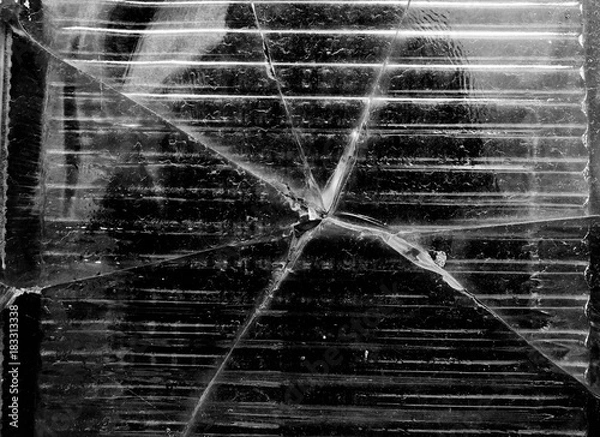 Fototapeta Big crack on the glass wall black and white texture, background
