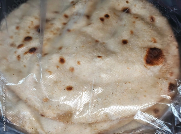 Fototapeta Stack of Fresh bread in Plastic Packaging