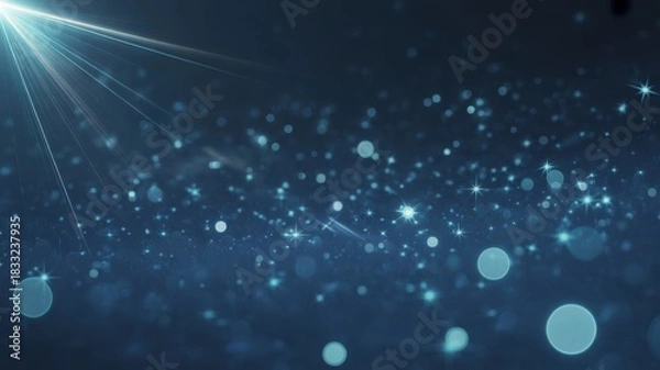 Fototapeta Ethereal blue light beam illuminates shimmering bokeh particles