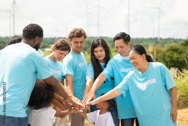 Fototapeta volunteer Community unity through diverse hands coming together. volunteer charity people. charity community service event, ngo business and outreach, Group Diverse people meeting at park for donation