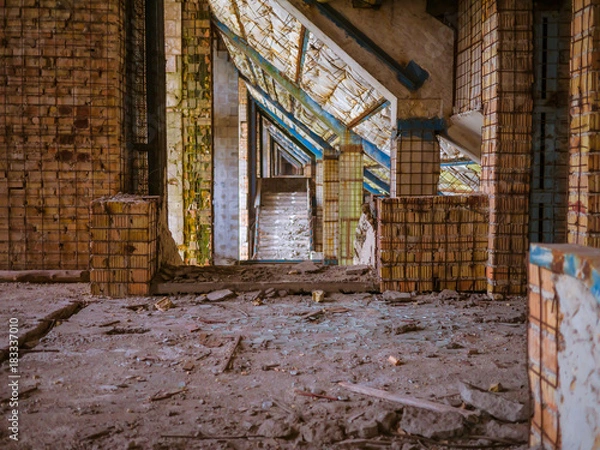 Obraz The old abandoned brick building. Steps.