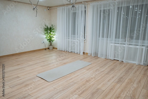 Fototapeta relaxing space designed for gentle yoga practice, peaceful and harmonious yoga setting that promotes relaxation and inner calmness through natural elements and subtle lighting