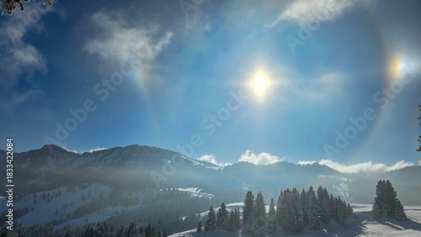 Obraz View of the halo around the sun on a winter day in Steibis in Allgau, Bavaria, Germany.