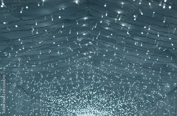 Obraz  Background of Glowing Christmas lights Fading into the Distanceю