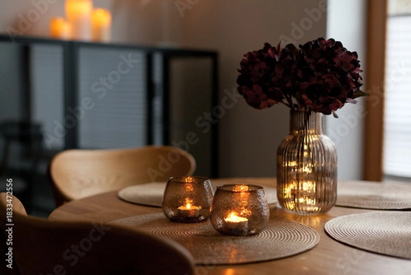 Obraz Led lights and interior decor on wooden table in scandinavian room. Hygge life style.