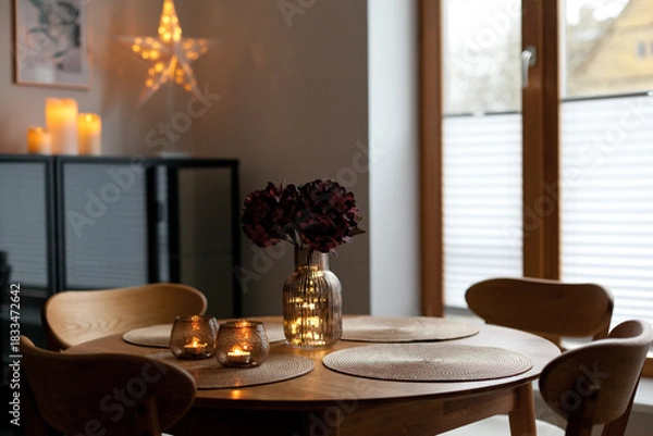 Obraz Led lights and interior decor on wooden table in scandinavian room. Hygge life style.