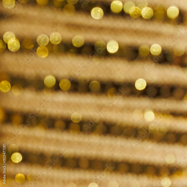 Fototapeta gold abstract bokeh background with soft shimmering circles and warm light blur