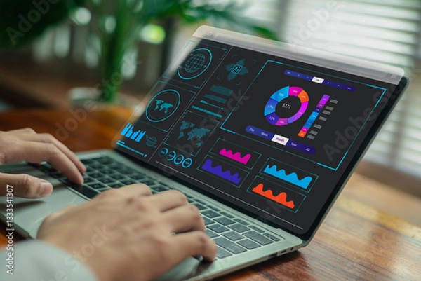 Fototapeta AI-powered analytics dashboard with colorful data charts, global metrics, and digital visualization displayed on a laptop, representing business analysis, performance insights, KPI tracking.