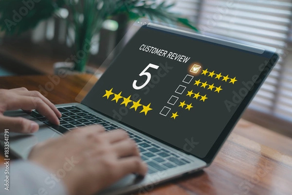 Fototapeta Customer review rating interface on a laptop screen showing five-star feedback, representing customer satisfaction, service quality evaluation, and digital user experience analytics.