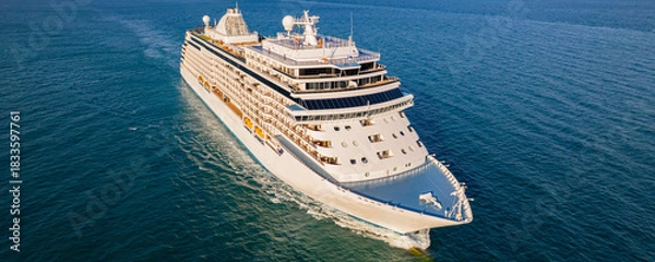 Fototapeta Cruise ships are sailing the seas, taking tourists on a journey around the world.