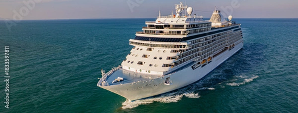 Fototapeta Cruise ships are sailing the seas, taking tourists on a journey around the world.