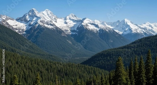 Obraz Snow-capped peaks rise above a lush valley