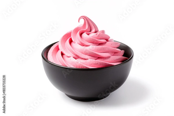 Fototapeta Pink strawberry soft serve frozen yogurt or ice cream swirl in black bowl isolated on white background. Creamy berry mousse dessert for summer refreshment.