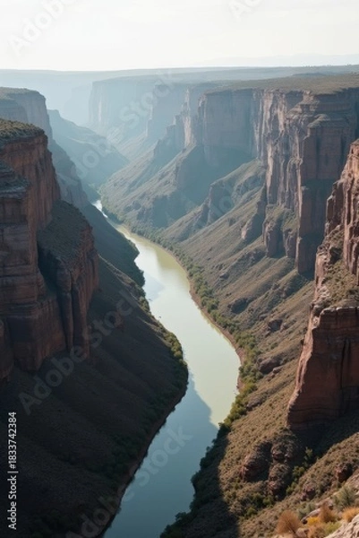 Obraz Majestic canyon with river winding through steep cliffs under sunlight