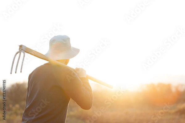 Obraz 鍬を持つ農家