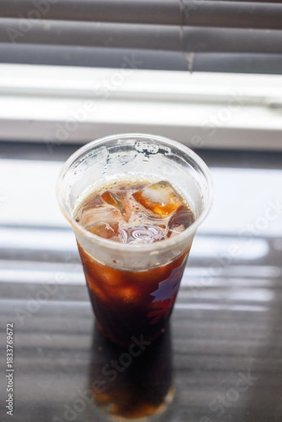 Obraz Iced black coffee in a plastic cup
