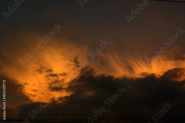 Obraz Golden-colored clouds during the evening.