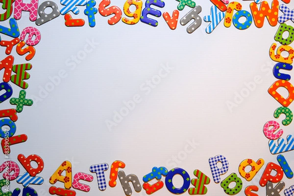 Fototapeta Magnetic Alphabet Letter Frame on Whiteboard with Copy Space