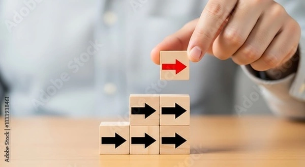 Obraz Unique business strategy concept with a leader setting a red arrow for growth and direction