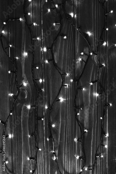 Obraz Christmas lights black and white effect background.