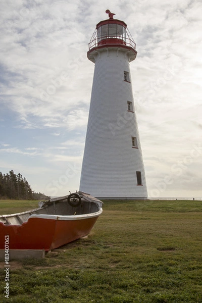 Obraz Point Prim Lighthouse, PEI and wooden boat