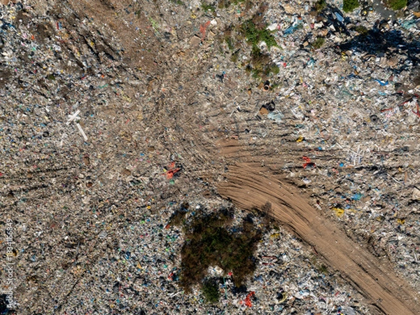 Obraz Aerial view of a landfill filled with large amounts of mixed household and plastic waste.