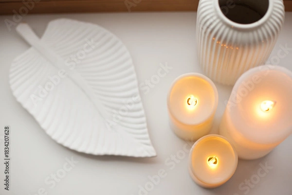 Obraz Led battery candles, tray and vase on white background