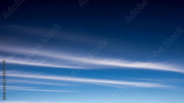 Fototapeta Beautiful blue sky with wispy clouds background for nature and sky lovers
