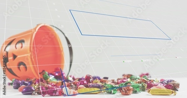 Fototapeta Tipping orange pumpkin bucket spilling wrapped candy on white table, with 3D grid and blue polygons