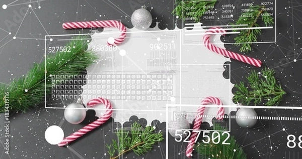 Fototapeta Displaying scalloped doily with candy canes, evergreen sprigs, silver baubles, HUD overlay on table