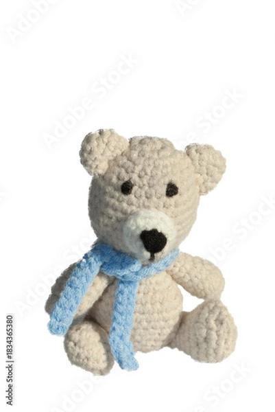 Obraz Petit ourson assis avec une écharpe bleue