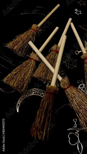 Obraz Witch brooms and magical symbols on black background occult charms, moon, stars and pentagram for mystical rituals and witchcraft