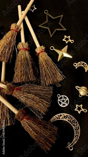 Obraz Witch brooms and magical symbols on black background occult charms, moon, stars and pentagram for mystical rituals and witchcraft