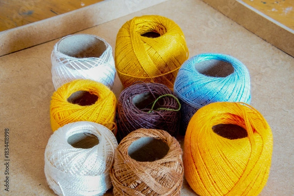 Obraz colorful wool rolls in a box