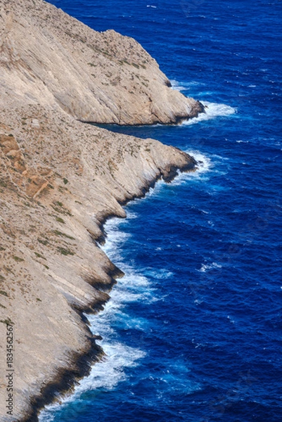 Obraz Folegandros coast, contrasting cliff and deep blue sea