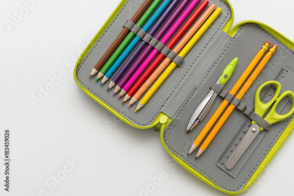 Obraz Open pencil case on white background