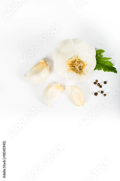 Fototapeta Garlic and herbs isolated on white background, top view